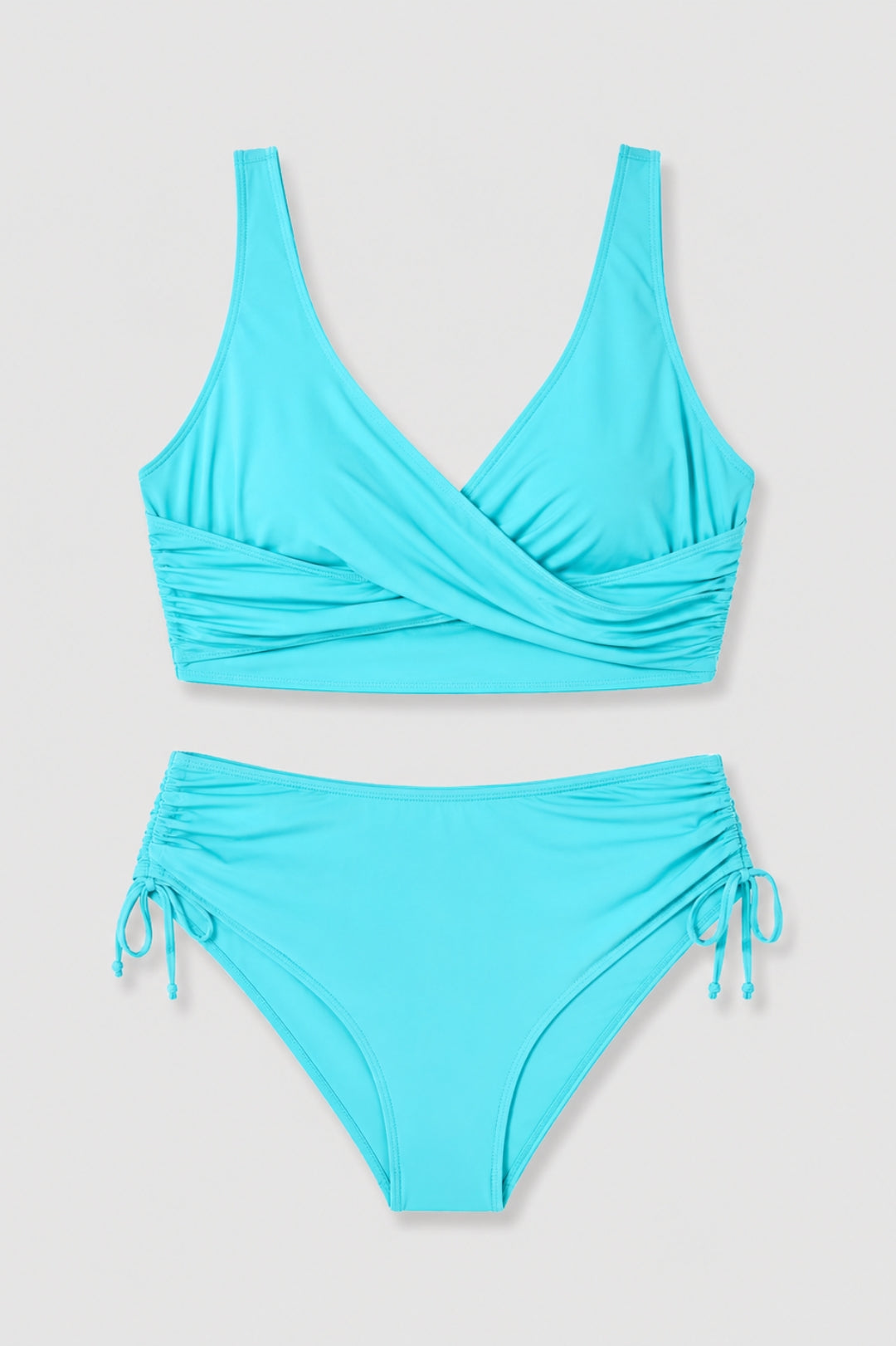 Noémie - Elegant Bikinikvinna Hög Midja med Korsad Top och Sidoband