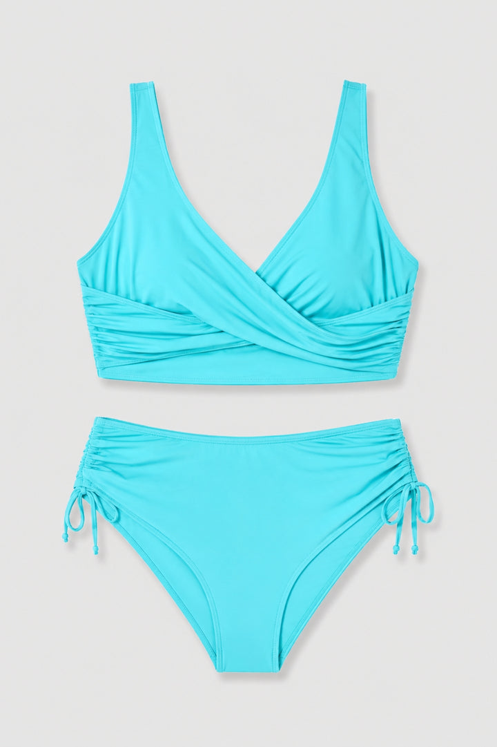 Noémie - Elegant Bikinikvinna Hög Midja med Korsad Top och Sidoband