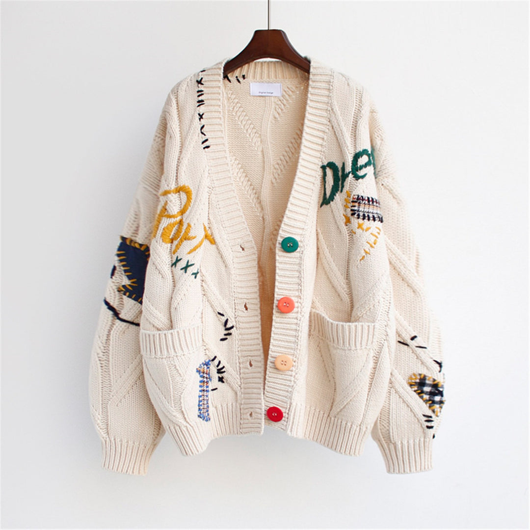 Stickad kofta dam med broderier i beige